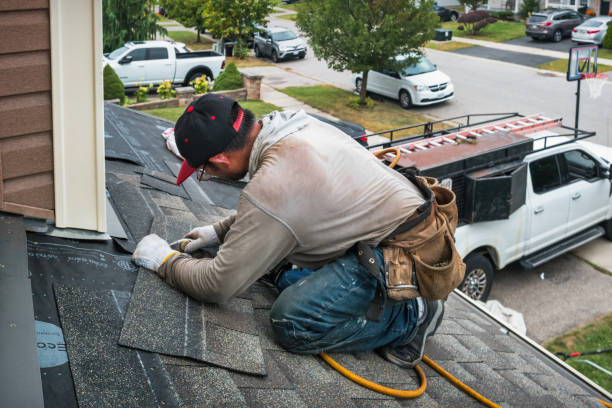 Professional Roof Replacement technician working in Roanoke, TX